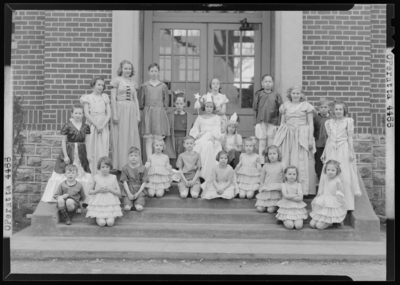 Operetta, North Middletown School; club members, group portrait                             in front of building