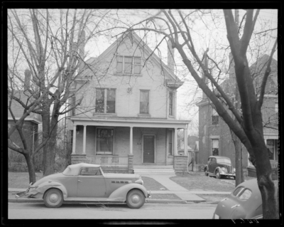 Sigma Phi Epsilon; Greek house, exterior view of building an cars                             parked in the street and driveway