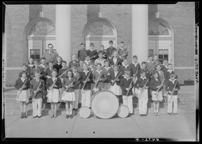 Band, Henry Clay High School, 701 East Main; band group portrait                             in front of building, members posing with their instruments