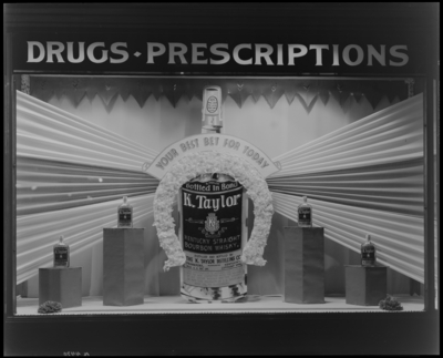 Phoenix Drug (100 East Main); window display, K. Taylor                             Whiskey