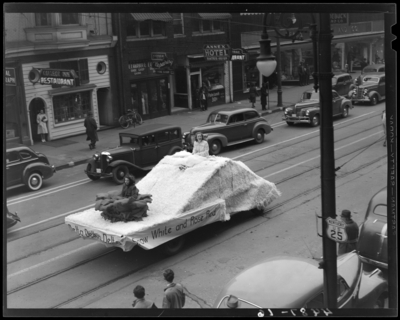 May Day Exercises, (1941 Kentuckian) (University of Kentucky);                             Delta Delta Delta float (Snow White and Rose Red) float going down East                             Main; Central Restaurant (211 East Main); Sears Roebuck (213-219 East                             Main); Harbor Shoe Repair (209 East Main); College Inn Restaurant (207                             East Main)