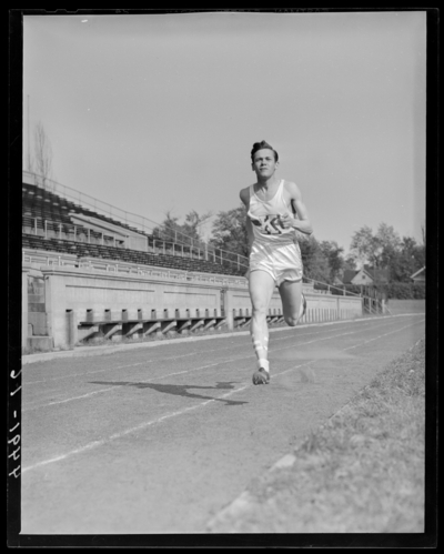 Track Team, (1941 Kentuckian) (University of Kentucky);                             individual member running on the track