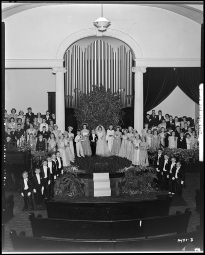Tom Thumb Wedding; North Middletown; interior of church, wedding                             party gathered around the alter