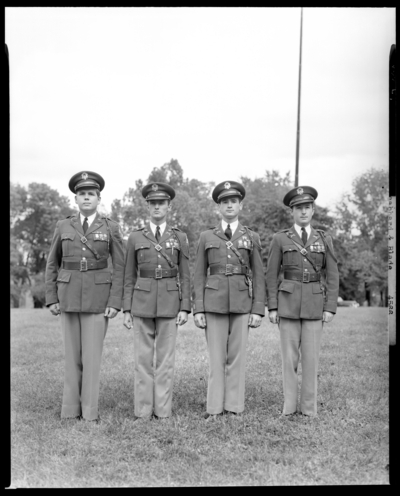 Scabbard & Blade, University of Kentucky; exterior, four                             men in uniform standing at attention