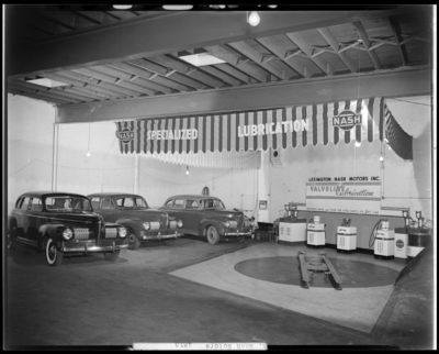 Lexington Nash Motors, 152 Rose; interior of garage, service                             bays; three cars parked