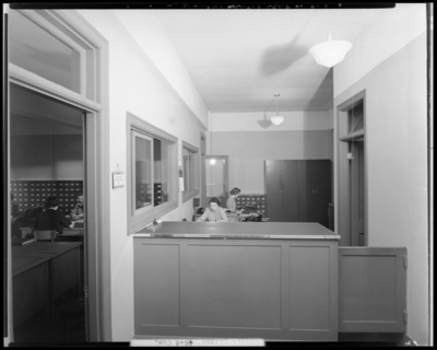 Lexington Credit Bureau; Radio Building, interior office; staff                             working at desk and tables
