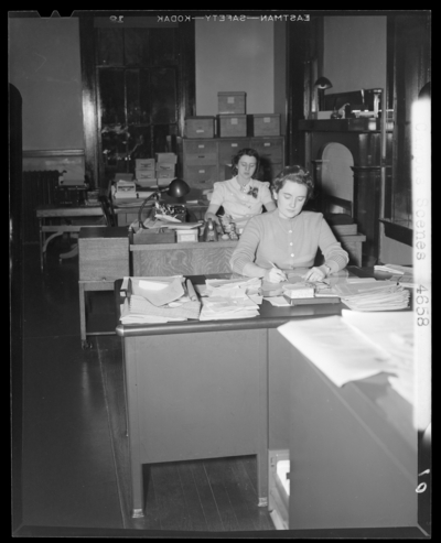 Campus Scenes, (1941 Kentuckian) (University of Kentucky); two                             women sitting at their desks