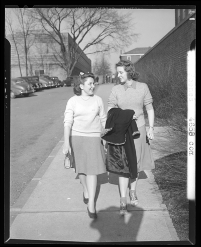 Campus Scenes, (1941 Kentuckian) (University of Kentucky); two                             women walking down the sidewalk