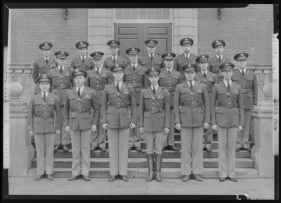 Military Company B, (1941 Kentuckian) (University of Kentucky);                             exterior library steps; group portrait of men in uniform