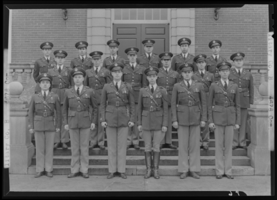 Military Company B, (1941 Kentuckian) (University of Kentucky);                             exterior library steps; group portrait of men in uniform