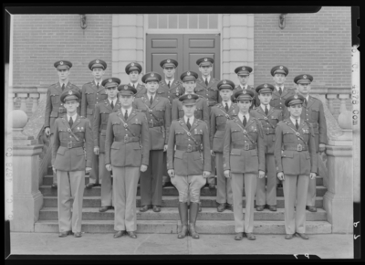 Military Company C (1941 Kentuckian) (University of Kentucky);                             exterior library steps; group portrait of men in uniform