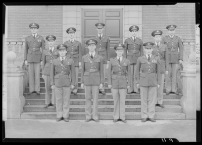 Military Company F, (1941 Kentuckian) (University of Kentucky);                             exterior library steps; group portrait of men in uniform