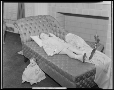 Grace C. Cloud; corpse of little girl on chaise lounge, doll on                             the floor in front of chaise lounge
