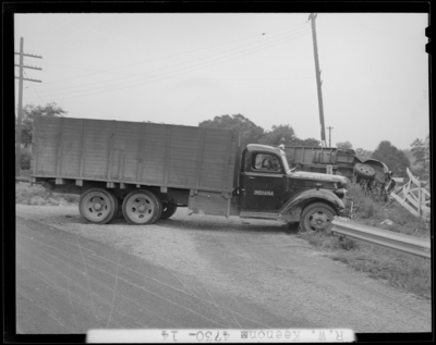 R.W. Keenon, Attorney; accident scene photographs, automobile                             wreck (crash) on Harrodsburg Pike; death (woman, wife); damaged truck                             (side view)