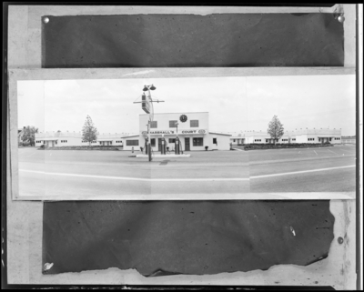Marshall’s Court Tourist (Georgetown Road); exterior view of                             court and gas pumps (service station), copy negative of                             print