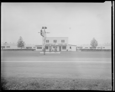 Marshall’s Court Tourist (Georgetown Road); exterior view of                             court and gas pumps (service station)