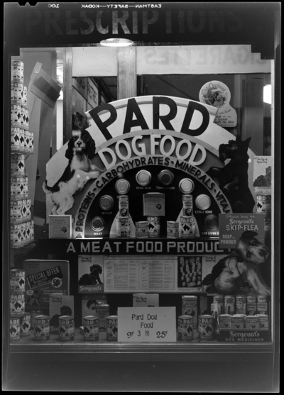 Hubbard & Curry Druggists (136 North Limestone);                             exterior, window display for Pard Dog Food
