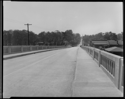 West Main Street Viaduct; John Crosby; view from bridge looking                             towards Savage Lumber & Manufacturing Company