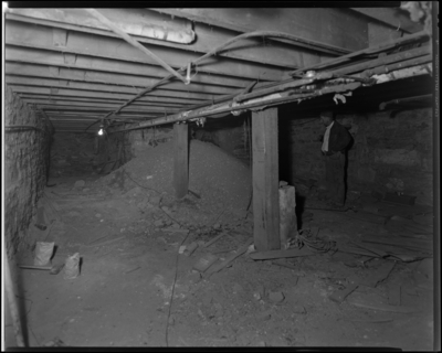 Ben Snyder (department store, 113-117 East Main) building;                             cellar, workers and construction debris