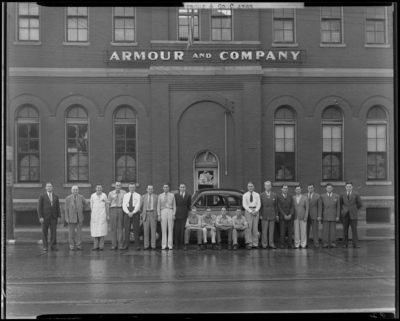 Armour & Company (wholesale meats), 318 East Main;                             exterior of building, group portrait