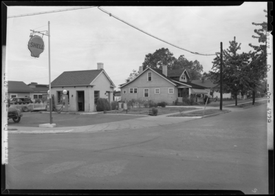 Perry Lumber Company, 246 Walton Avenue; Spur Distributing                             Company (Shell Gas Station), corner of Walton & National);                             exterior view from across the street