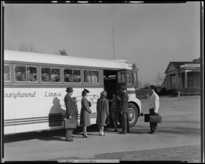 Southeastern Greyhound Lines; coaches, exterior of bus number 712                             (no. 712), passengers boarding bus