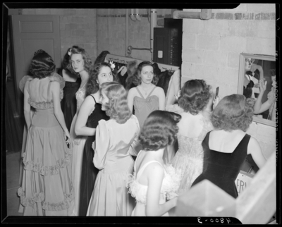 Beauty Contestants & Queen, (1942 Kentuckian) (University                             of Kentucky); Memorial Hall, interior; contestants getting ready in                             dressing room