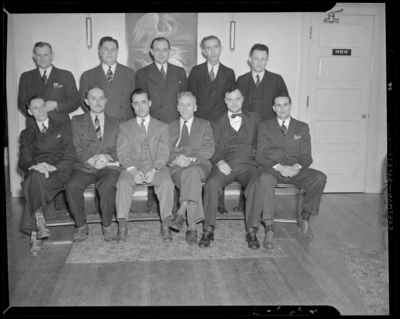Kraft Cheese Corporation; Central Food Dealers Association,                             officers & directors meeting at the Honey Krust Bakery;                             interior, group portrait