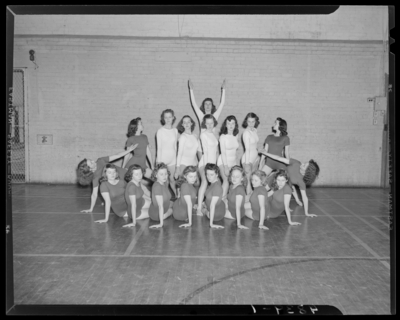 Modern Dance Club, (1942 Kentuckian) (University of Kentucky);                             basketball court, interior; group portrait