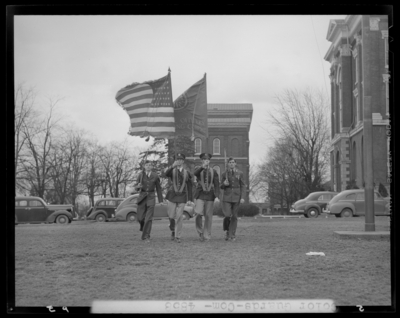 Color Guards, (1942 Kentuckian) (University of Kentucky);                             exterior of Buell Armory, marching exercises
