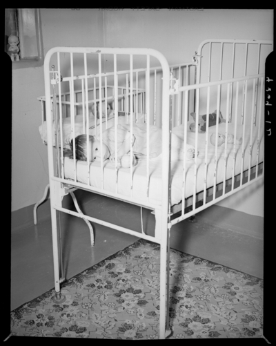 Kentucky Crippled Children’s Commission, Good Samaritan Hospital;                             baby in a crib