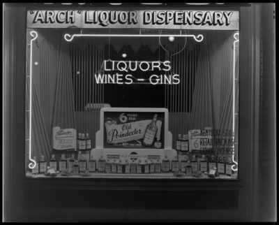 Arch Liquor Dispensary, 226-228 East Main; exterior, window                             display for 