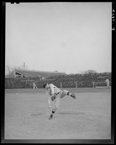 Baseball players, (1942 Kentuckian) (University of Kentucky);                             individual player throwing ball