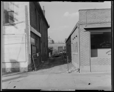 Brown Motors, 141-145 Church; exterior, alley between buildings;                             Rowe Blueprint and Supply Company, 131-135 Church