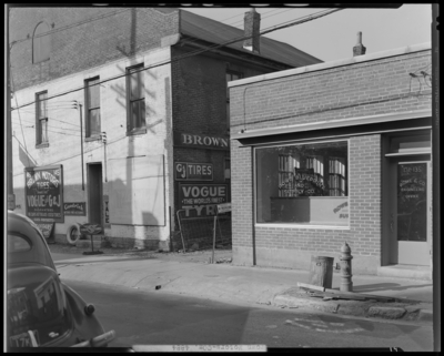 Brown Motors, 141-145 Church; exterior, alley between buildings;                             Rowe Blueprint and Supply Company, 131-135 Church