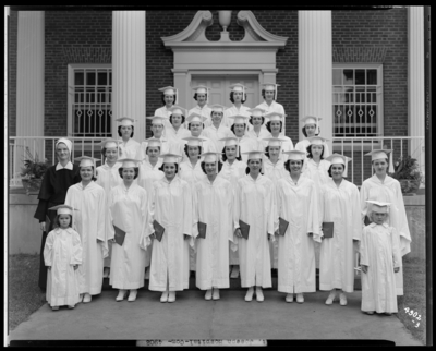 St. Joseph's Hospital, 544 West Second (2nd) Street; nurses,                             graduating class, 1942; building, exterior; group portrait
