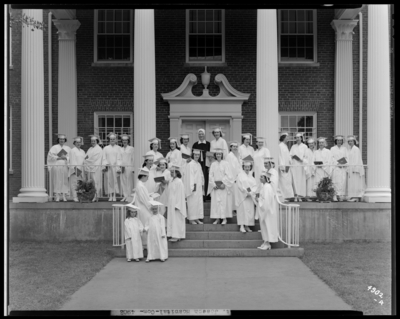 St. Joseph's Hospital, 544 West Second (2nd) Street; nurses,                             graduating class, 1942; building, exterior; group gathered in front of                             building steps