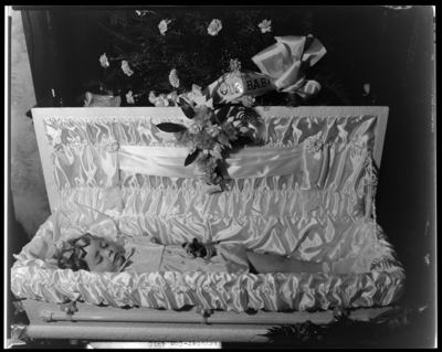 Jeanette Grace Waggoner, 641 West Short; corpse; open casket                             surrounded by flowers