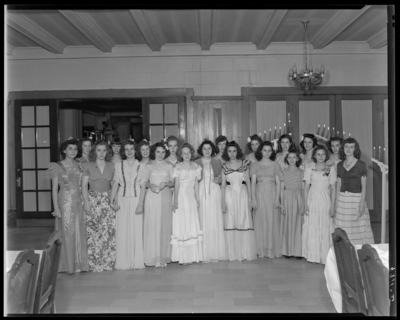 Girl Reserve; Ring group, YWCA (Young Women's'                             Christian Association); group of women dressed in formal attire; group                             portrait