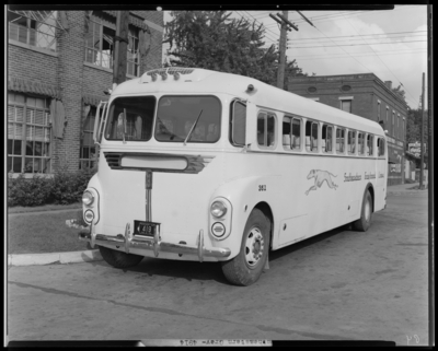 Southeastern Greyhound Lines (bus), 801 North Limestone;                             building, exterior; bus number 351 (no. 351) parked on the street; front                             view