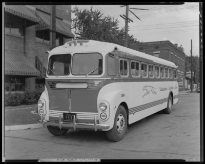 Southeastern Greyhound Lines (bus), 801 North Limestone;                             building, exterior; bus number 350 (no. 350) parked on the street; front                             view