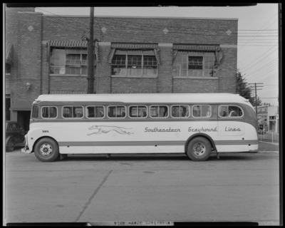 Southeastern Greyhound Lines (bus), 801 North Limestone;                             building, exterior; bus number 350 (no. 350) parked on the street;                             driver's side view