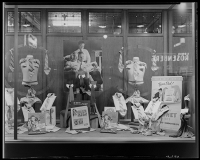 Graves Cox & Company, clothing company, 124-132 East                             Main; men’s clothing window display; photographs request by the Saturday                             Evening Post