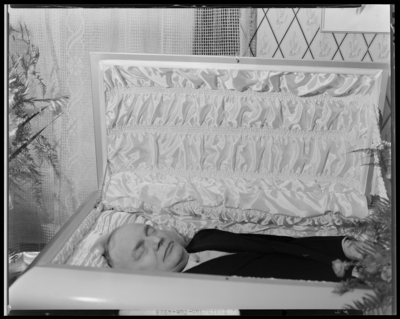 A.M. Ethington; corpse, open casket; close-up view of upper                             torso