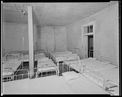 Engineering & Construction Division; Eastern State                             Hospital, 627 West Fourth (4th); building, interior; room (ward) filled                             with beds