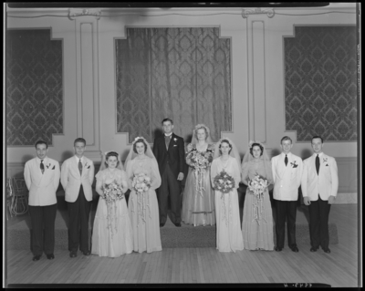 Mr. & Mrs. Jay Richard Miller Jr.; group portrait of                             wedding couple, bridesmaids, groomsman