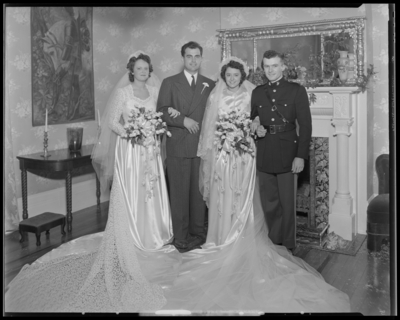 Robinson Wedding (two weddings); West Maple, Nicholasville);                             portrait book; both wedding parties standing in front of a fireplace;                             group portrait