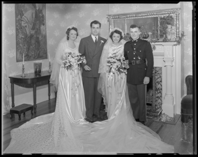 Robinson Wedding (two weddings); West Maple, Nicholasville);                             portrait book; both wedding parties standing in front of a fireplace;                             group portrait
