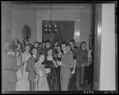 M.M.I. & Sayre College, 194 North Limestone; reception                             & glee club; room filled with reception attendees