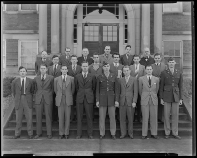 Sigma Pi Sigma group standing on steps of building (1943                             Kentuckian) (University of Kentucky)